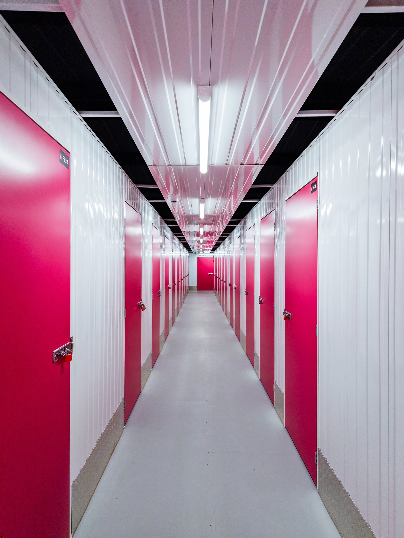 Organised business storage with shelving and boxes in an illustrative Store Hub storage-unit setting.